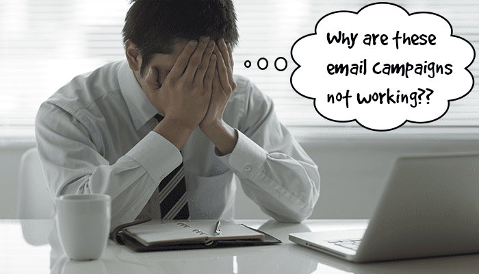 Man stressing with hands on his face due to Poor B2B Emails