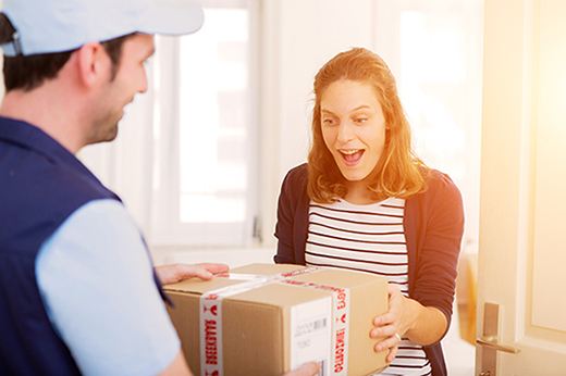 Woman receiving her order delivery